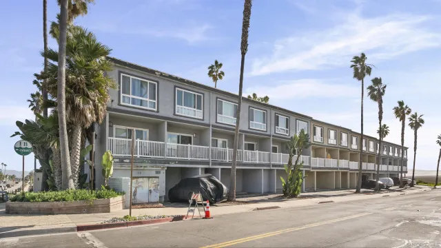 a view of a street with a building in the background