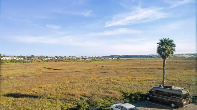 a view of a ocean with beach
