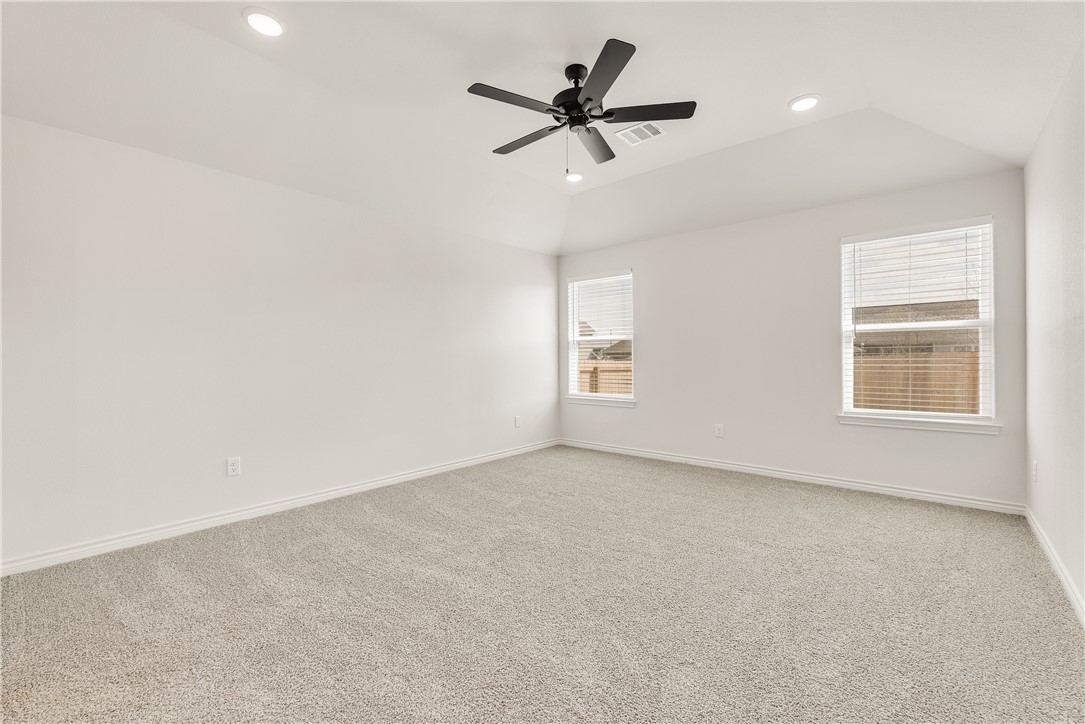 3176 Margaret Rudder Parkway Bryan, TX 77808 - Photo 14 of 31 Primary bedroom located at the back of the home