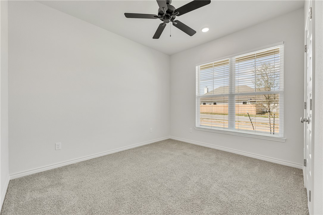 3176 Margaret Rudder Parkway Bryan, TX 77808 - Photo 21 of 31 Secondary bedroom 1 located at the front of the home
