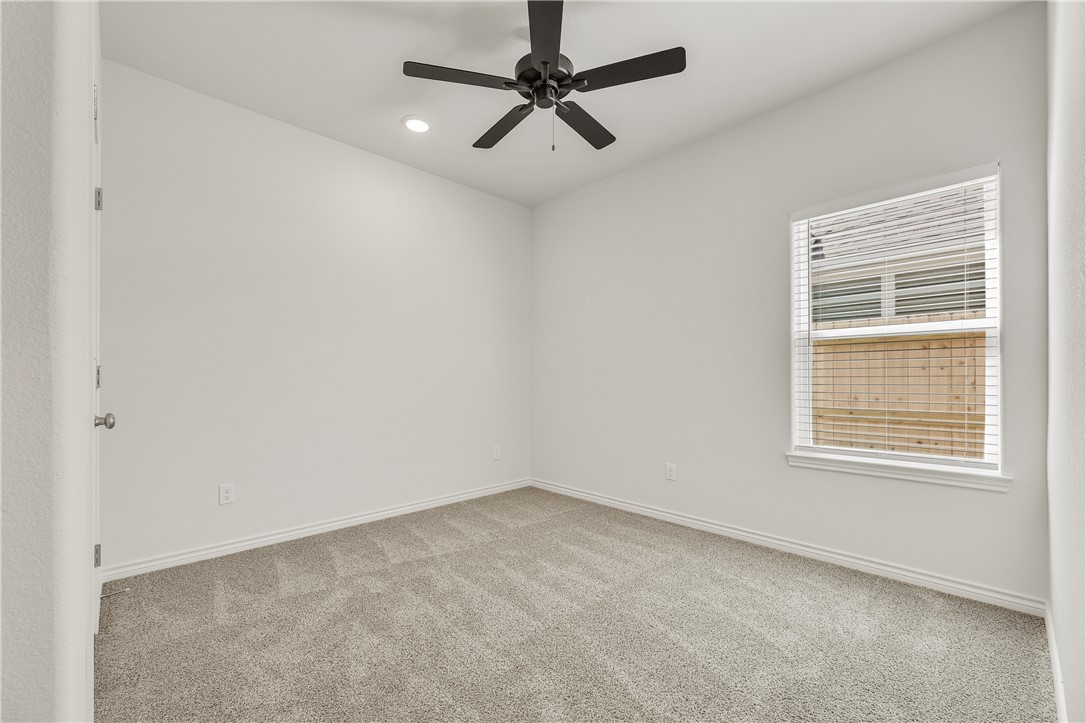 3176 Margaret Rudder Parkway Bryan, TX 77808 - Photo 23 of 31 Secondary bedroom 2 located on the side of the home