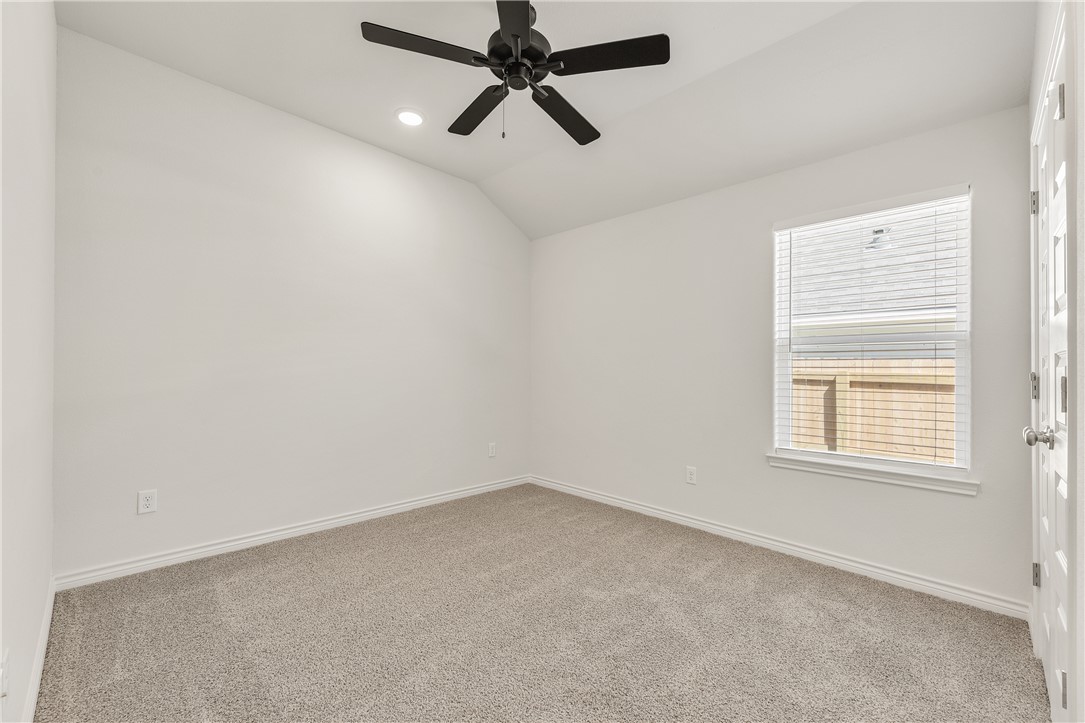3176 Margaret Rudder Parkway Bryan, TX 77808 - Photo 24 of 31 Secondary bedroom 2 located on the side of the home