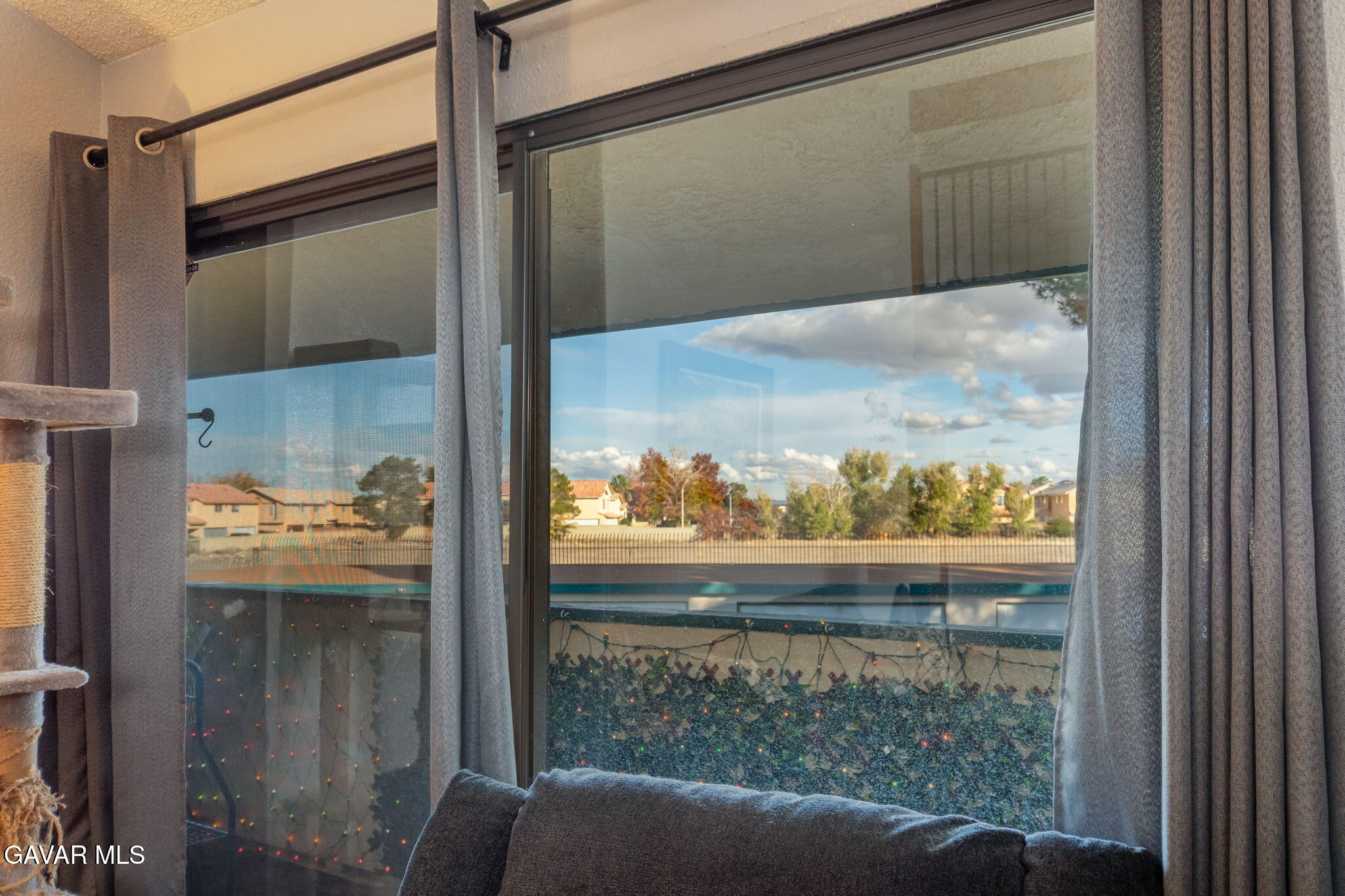 44442 15th Street East, Unit 5 Lancaster, CA 93535 - Photo 12 of 23 a view of a glass door and wooden floor