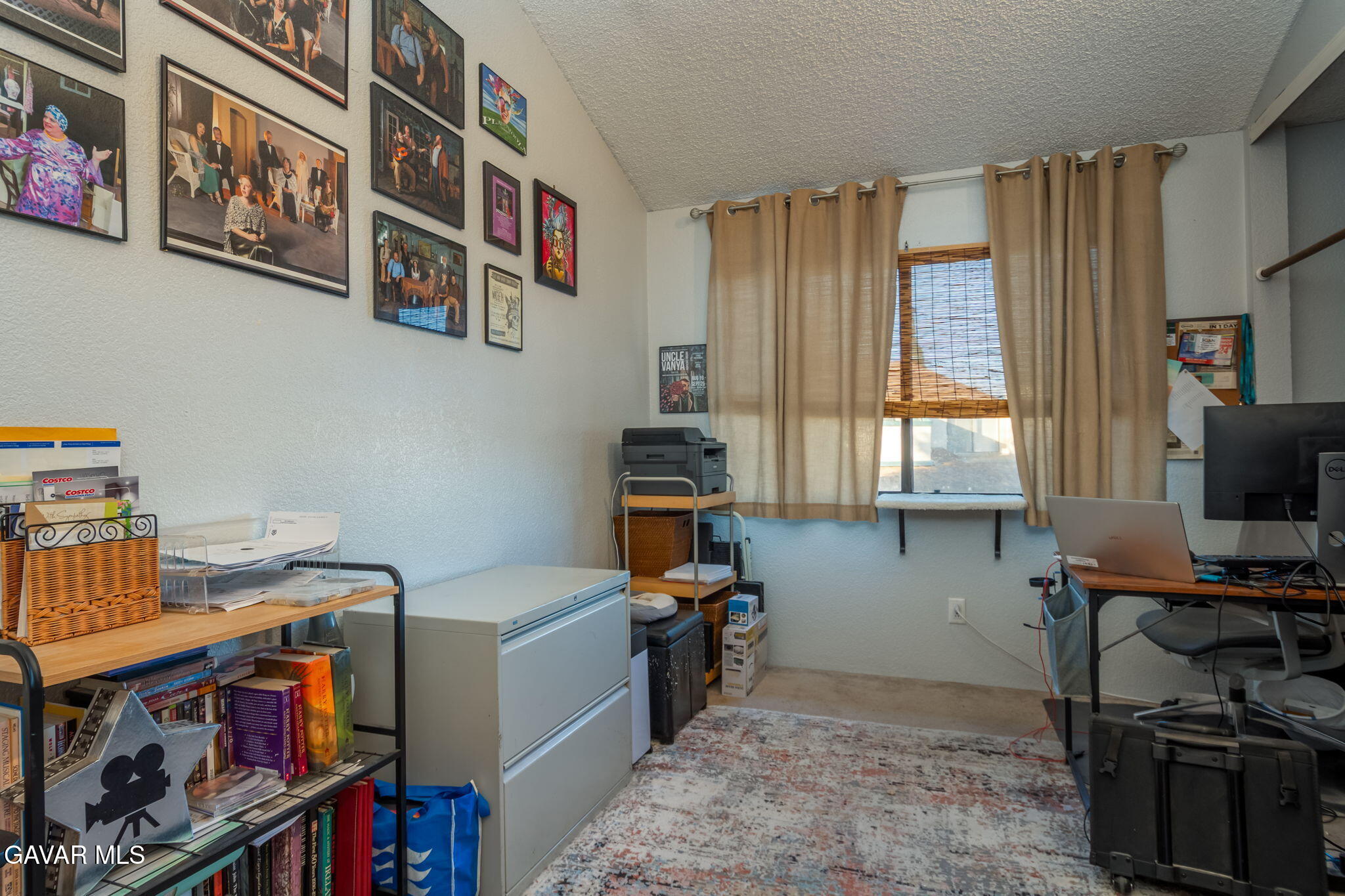 44442 15th Street East, Unit 5 Lancaster, CA 93535 - Photo 8 of 23 a view of a workspace with furniture and a window