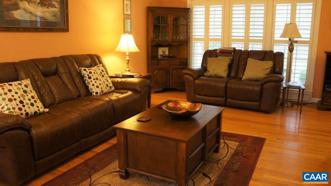3621 Keswick Road Keswick, VA 22947 - Photo 17 of 50 a living room with furniture and wooden floor