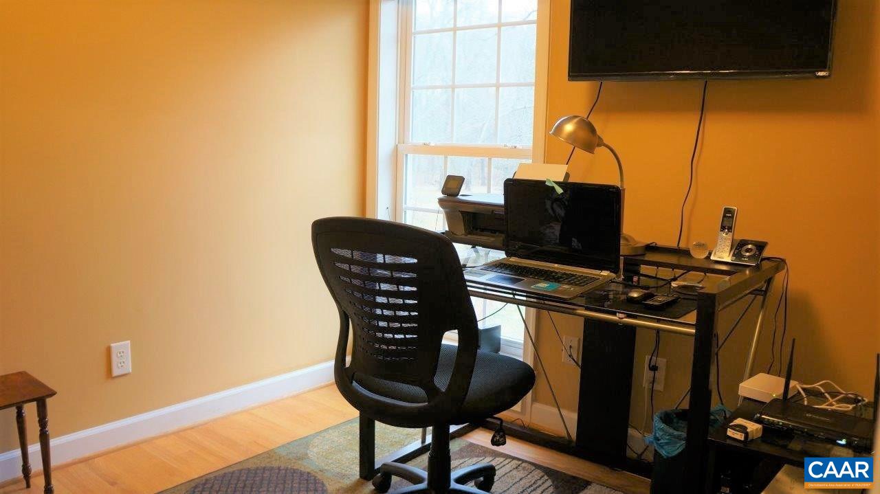 3621 Keswick Road Keswick, VA 22947 - Photo 19 of 50 a view of a workspace with furniture