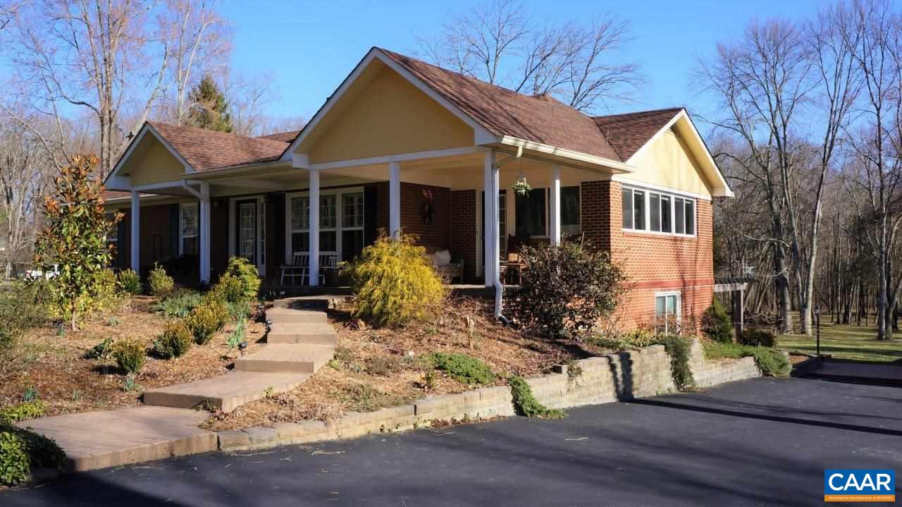 3621 Keswick Road Keswick, VA 22947 - Photo 2 of 50 a view of a house with yard and sitting area