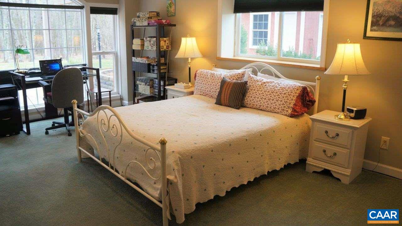 3621 Keswick Road Keswick, VA 22947 - Photo 39 of 50 a bedroom with bed and window