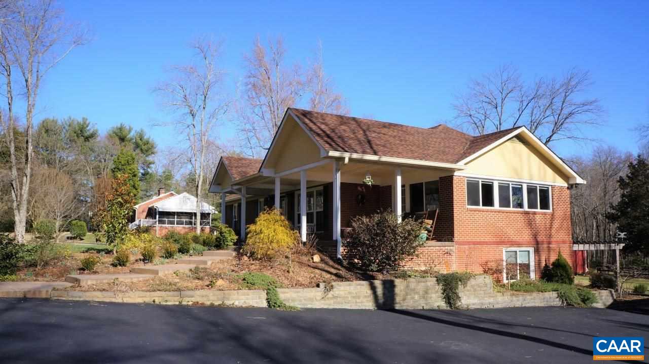 3621 Keswick Road Keswick, VA 22947 - Photo 4 of 50 a front view of a house with garden