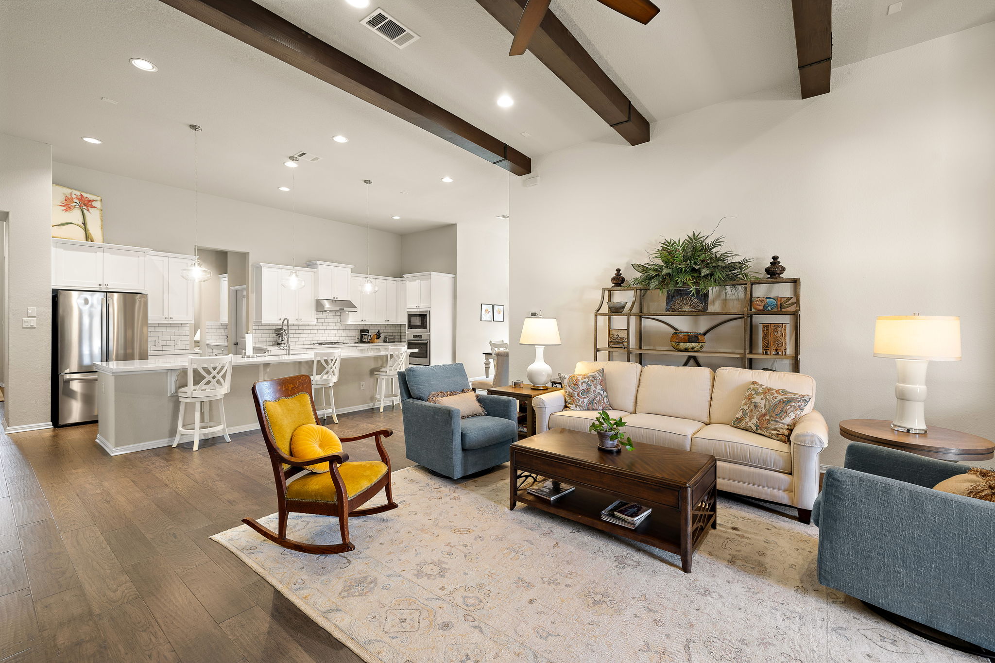 5016 Yucca Flower Lane Georgetown, TX 78626 - Photo 8 of 30 a living room with furniture and kitchen view