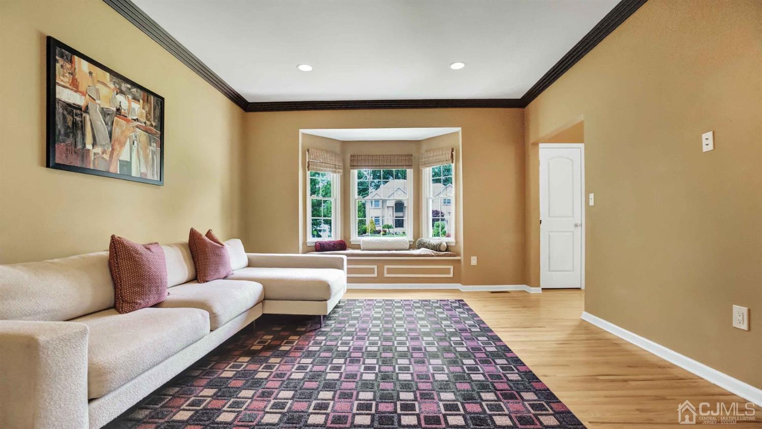 7 Homestead Road Edison, NJ 08820 - Photo 22 of 68 a living room with furniture and a large window