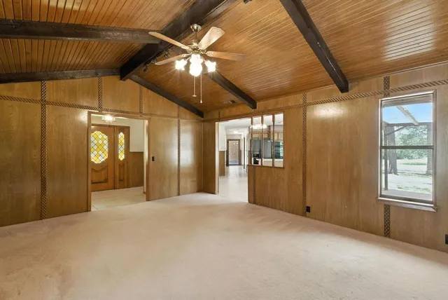 a view of a hallway with a chandelier