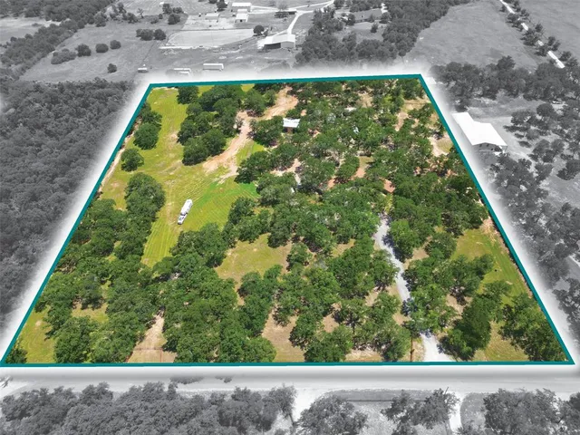 view of a yard with wooden fence
