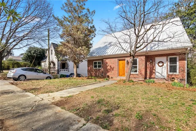 a house with trees in front of it