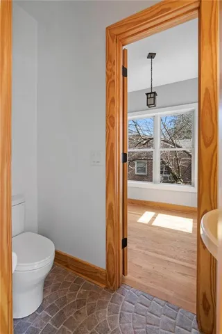 a view of hallway with wooden floor