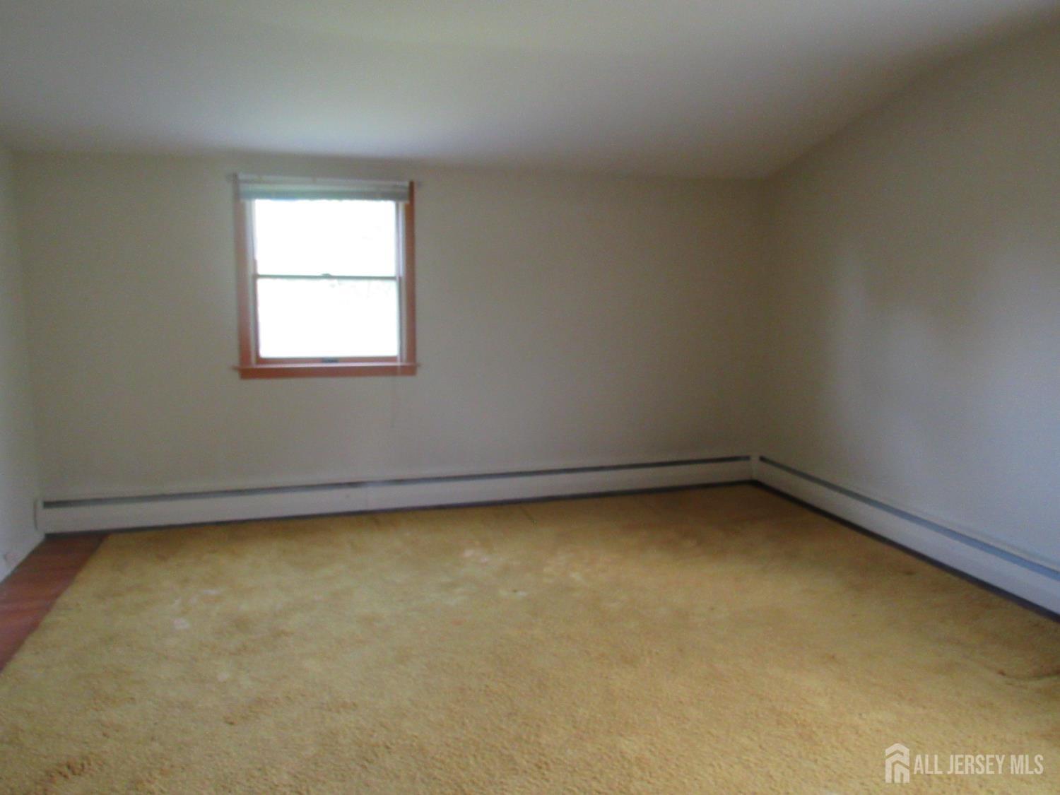206 Overbrook Road Piscataway, NJ 08854 - Photo 12 of 34 an empty room with a window