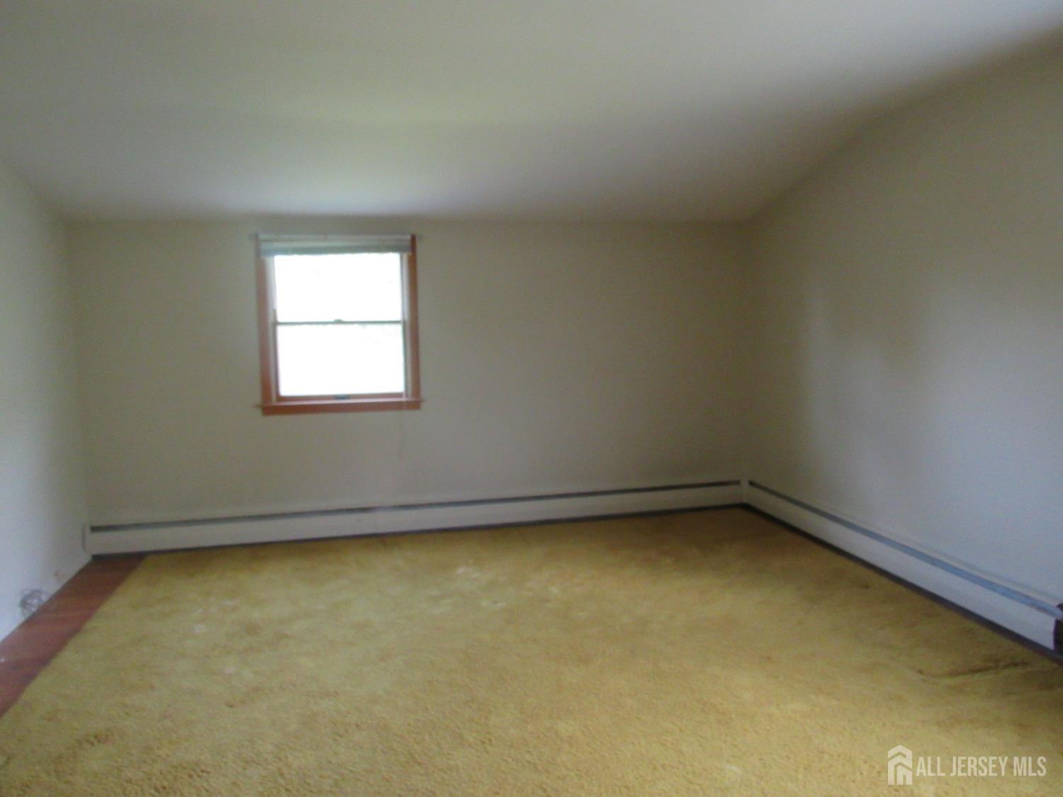 206 Overbrook Road Piscataway, NJ 08854 - Photo 13 of 34 an empty room with a window