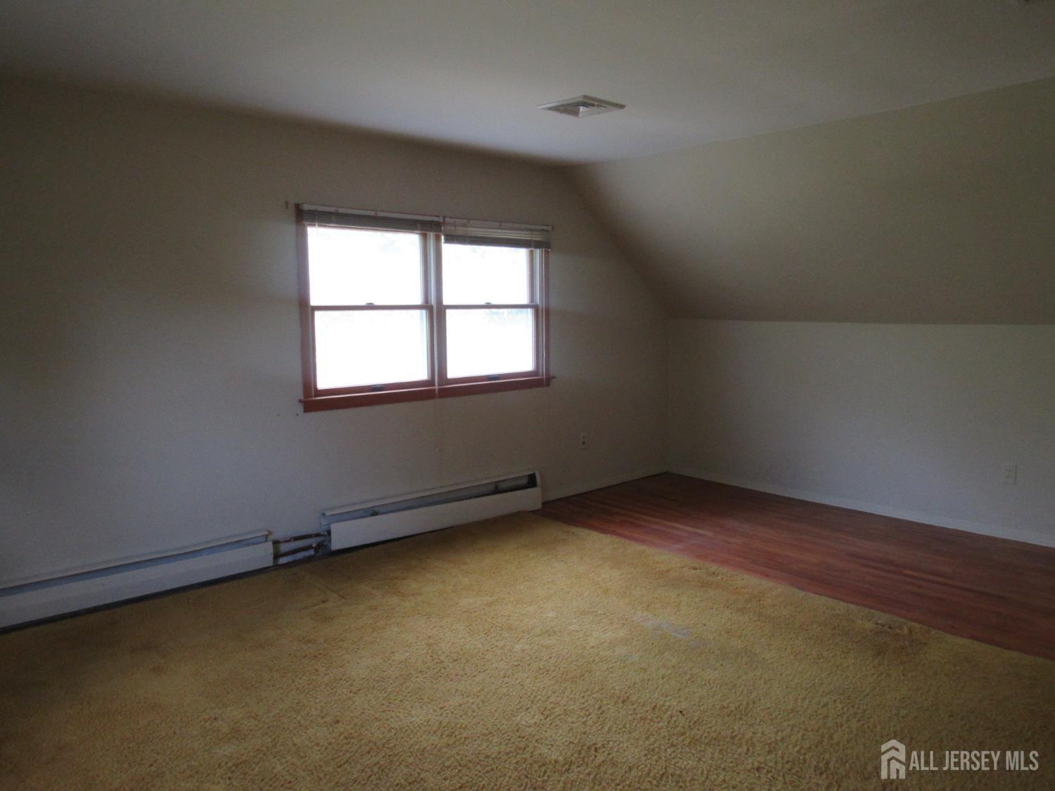 206 Overbrook Road Piscataway, NJ 08854 - Photo 15 of 34 an empty room with a window