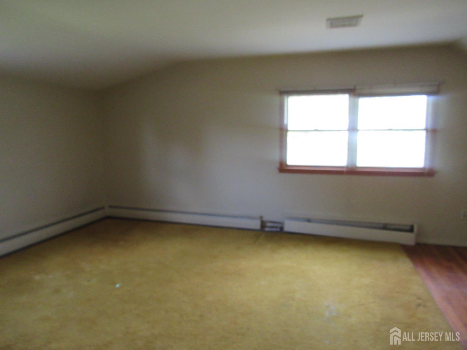 206 Overbrook Road Piscataway, NJ 08854 - Photo 16 of 34 an empty room with a window