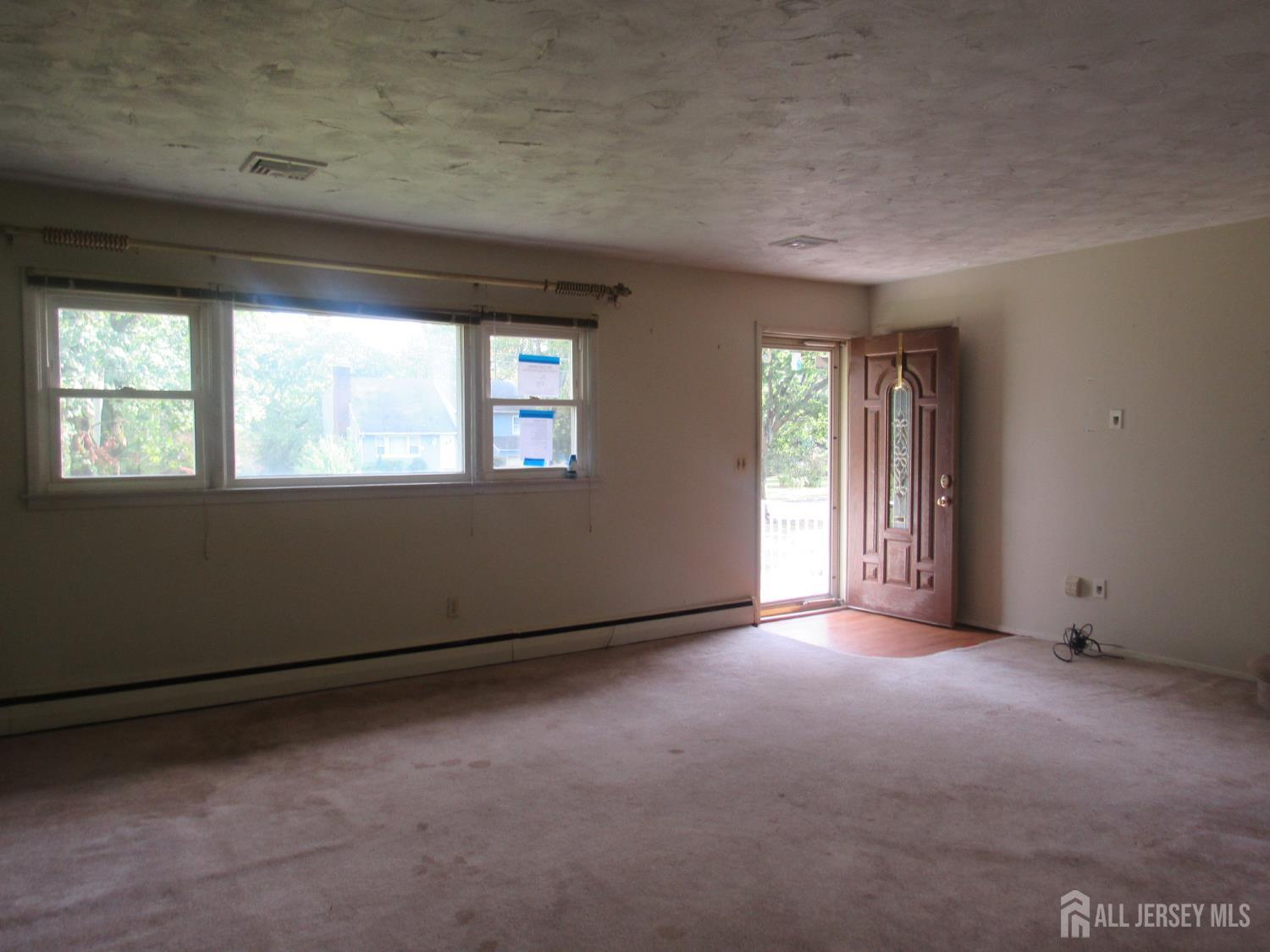 206 Overbrook Road Piscataway, NJ 08854 - Photo 23 of 34 an empty room with windows
