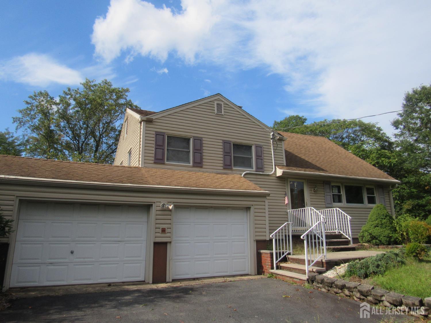 206 Overbrook Road Piscataway, NJ 08854 - Photo 31 of 34 a front view of a house with a garage