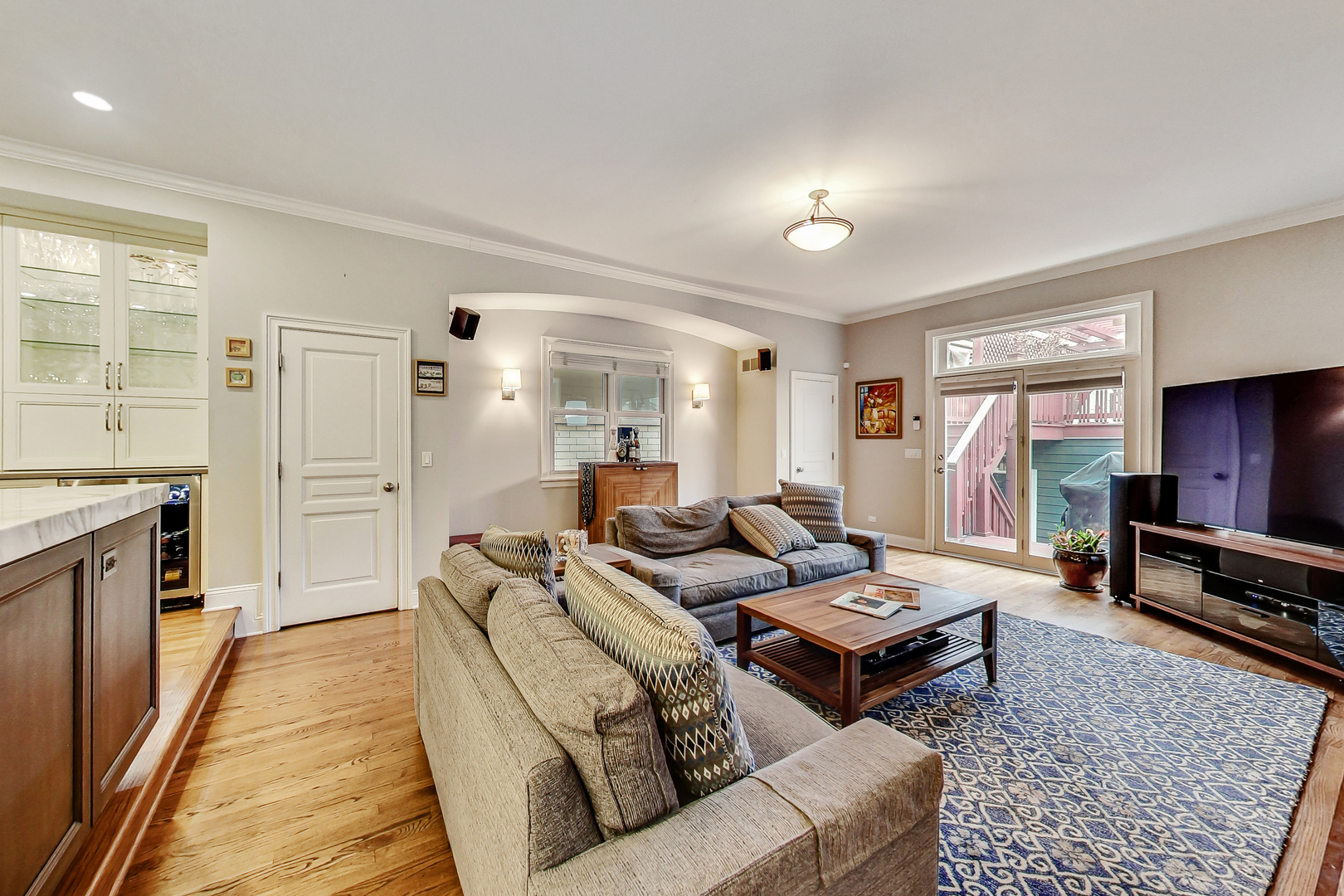 1508 West School Street Chicago, IL 60657 - Photo 12 of 40 a living room with furniture and a flat screen tv