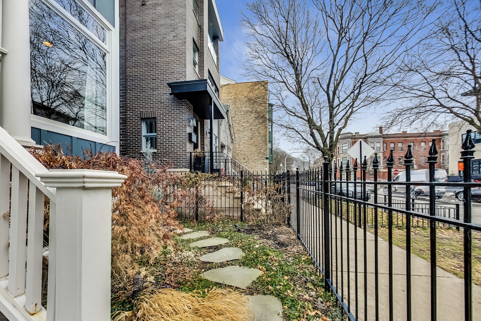 1508 West School Street Chicago, IL 60657 - Photo 2 of 40 a view of a house with iron fence