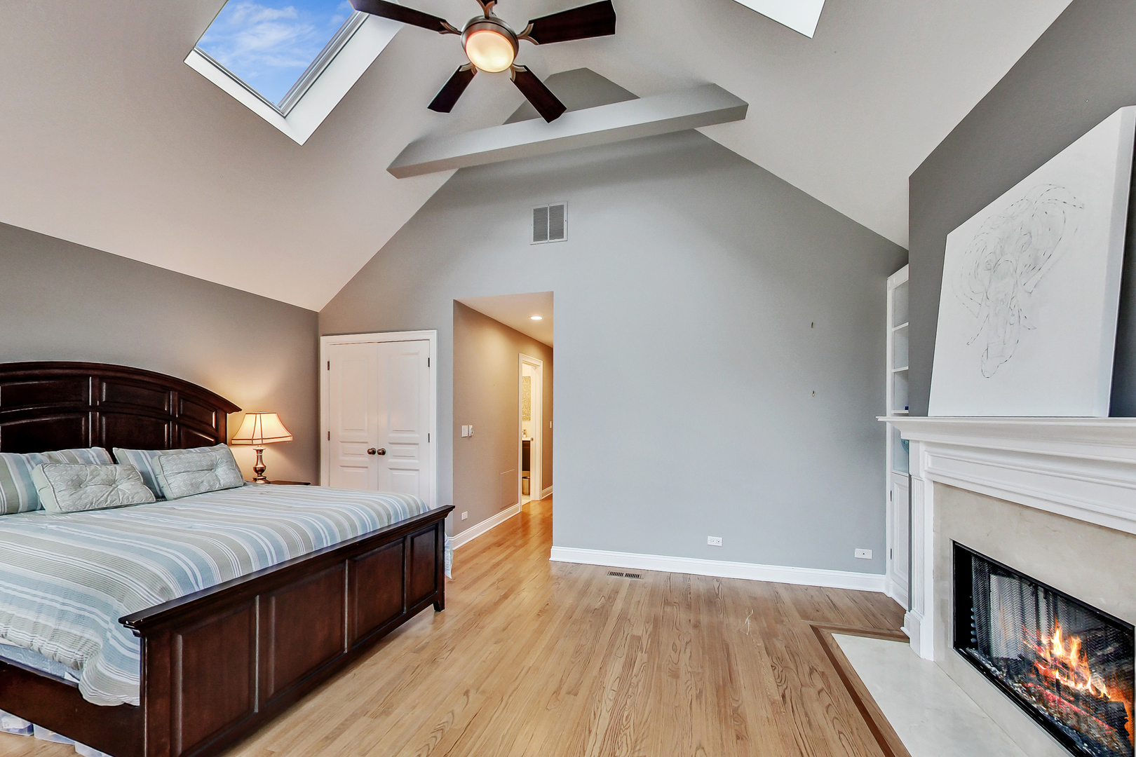 1508 West School Street Chicago, IL 60657 - Photo 21 of 40 a bedroom with a bed and a fireplace