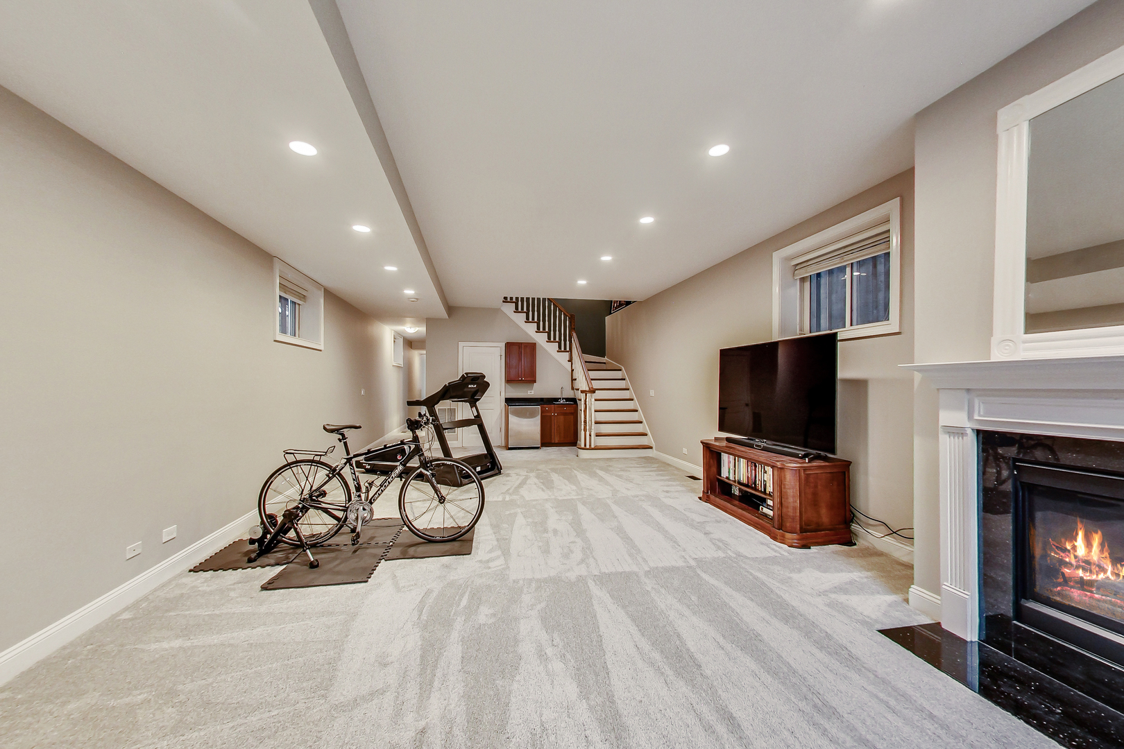 1508 West School Street Chicago, IL 60657 - Photo 30 of 40 a view of a livingroom with furniture and a flat screen tv