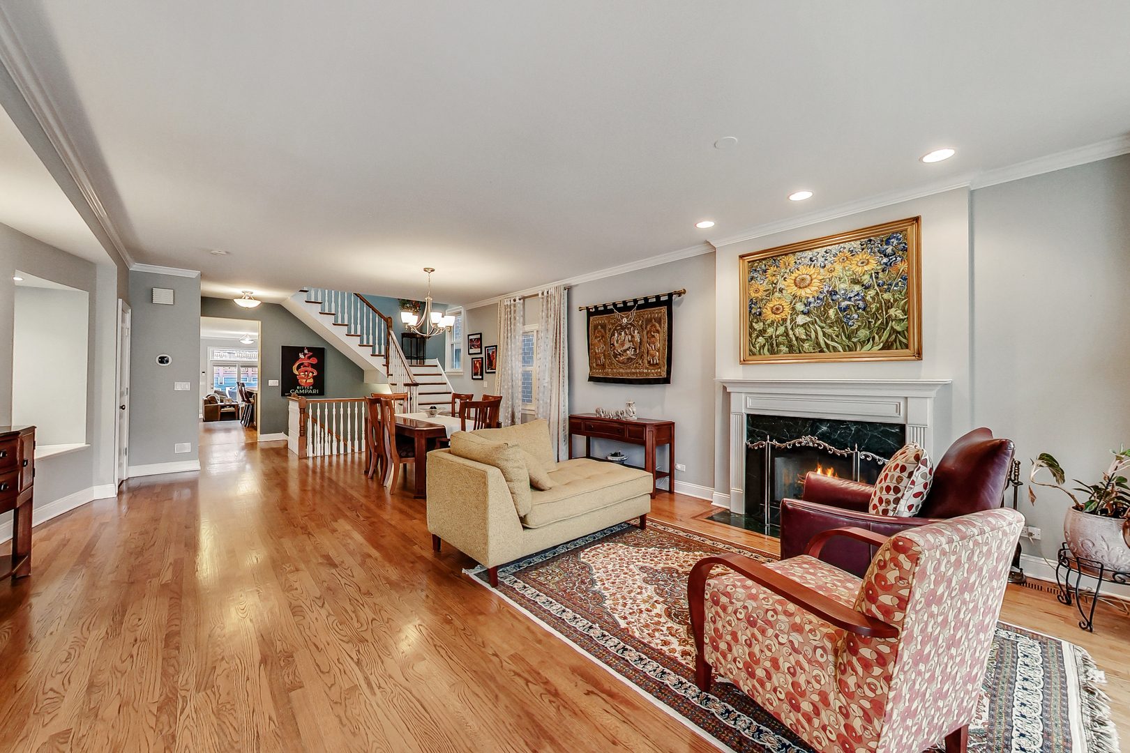 1508 West School Street Chicago, IL 60657 - Photo 3 of 40 a living room with furniture and a fireplace