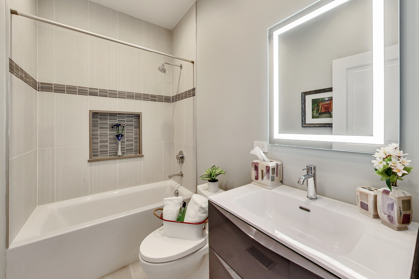 1508 West School Street Chicago, IL 60657 - Photo 34 of 40 a bathroom with a sink a toilet and shower