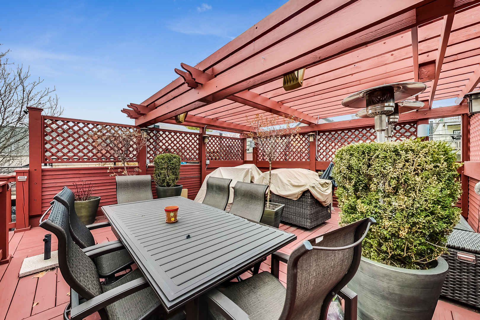 1508 West School Street Chicago, IL 60657 - Photo 38 of 40 a patio with a table and chairs