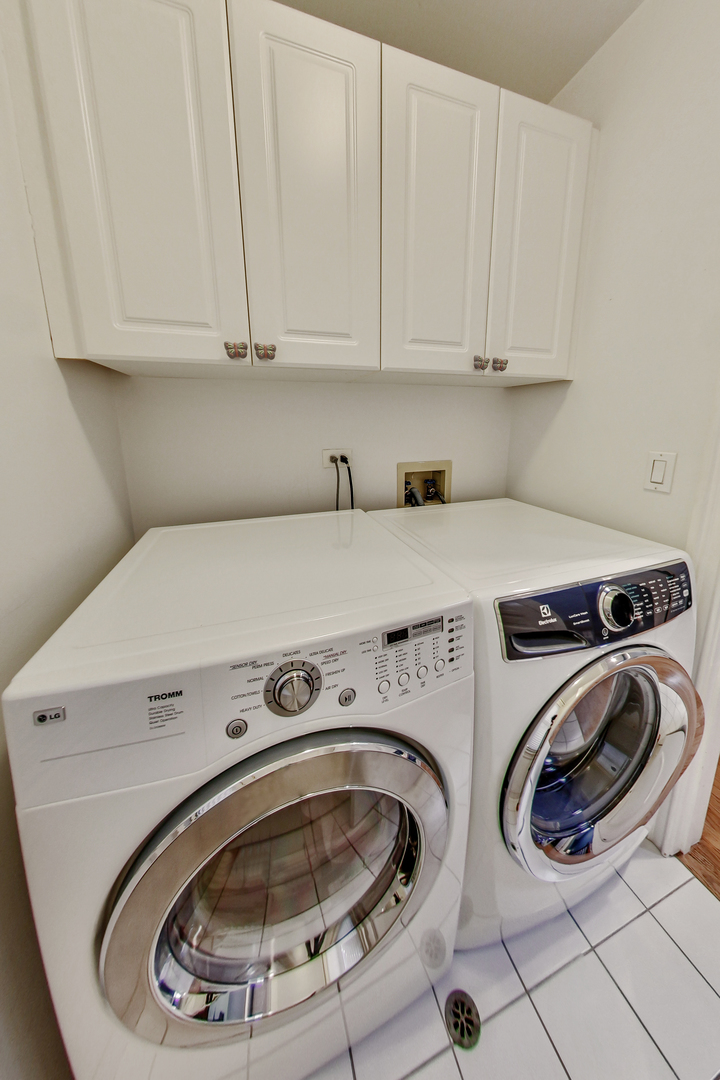 1508 West School Street Chicago, IL 60657 - Photo 40 of 40 a utility room with dryer and washer