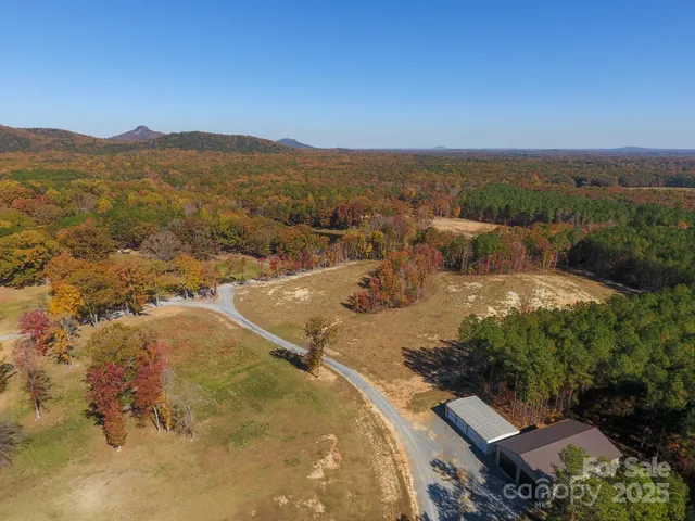 an aerial view of residential house with outdoor space