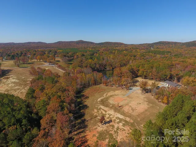 a view of a mountain with mountains in the background