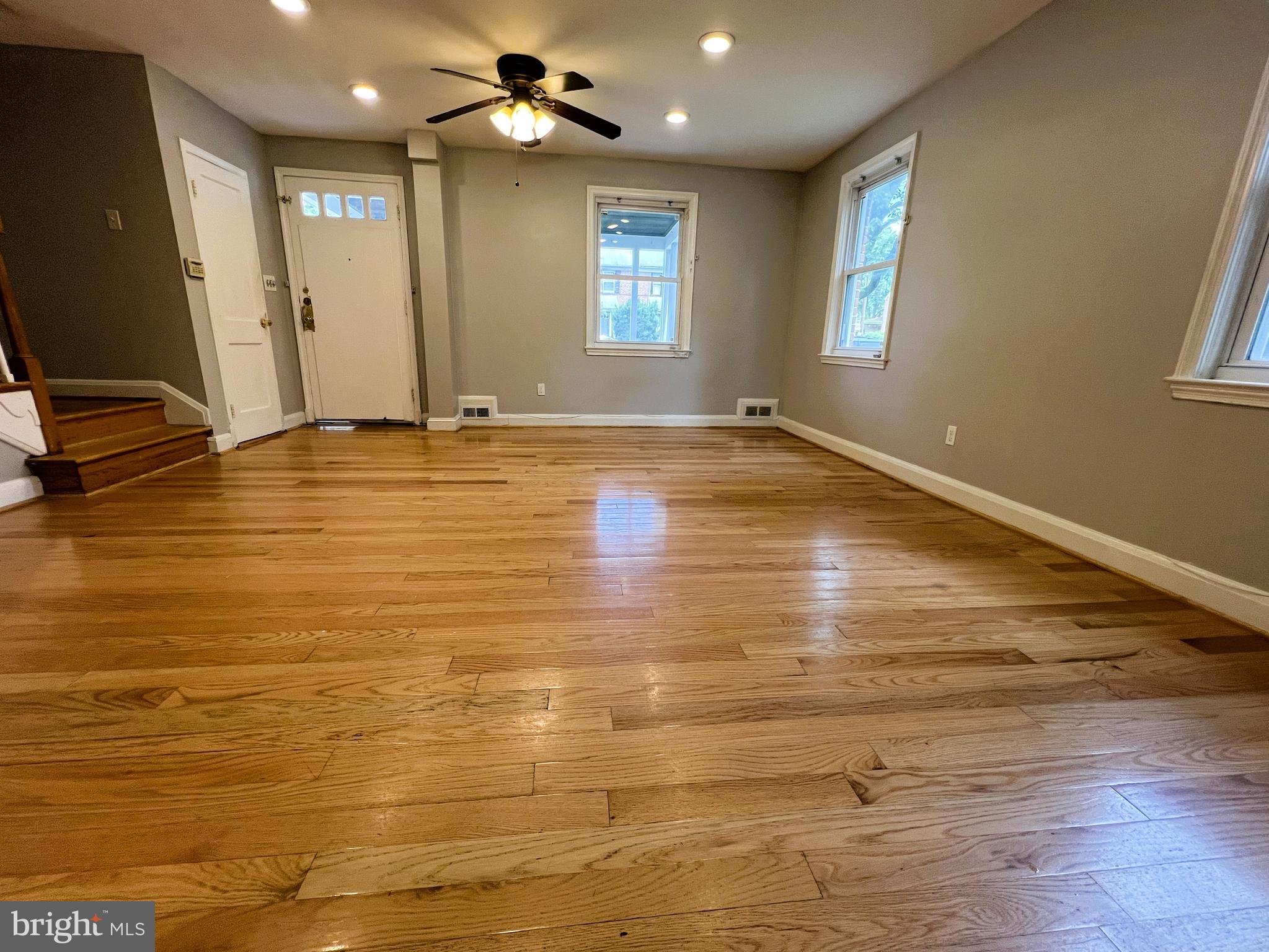 3705 Bancroft Road Baltimore, MD 21215 - Photo 19 of 50 a view of empty room with window and wooden floor