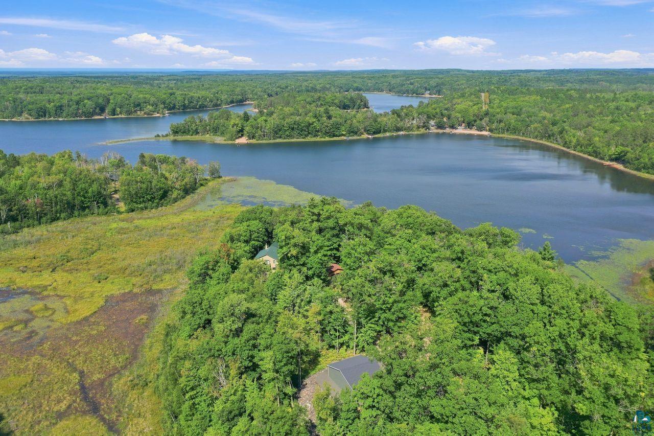 69085 East Long Lake Road Iron River, WI 54847 - Photo 31 of 33 Expansive natural landscape with surrounding water and dense tree coverage