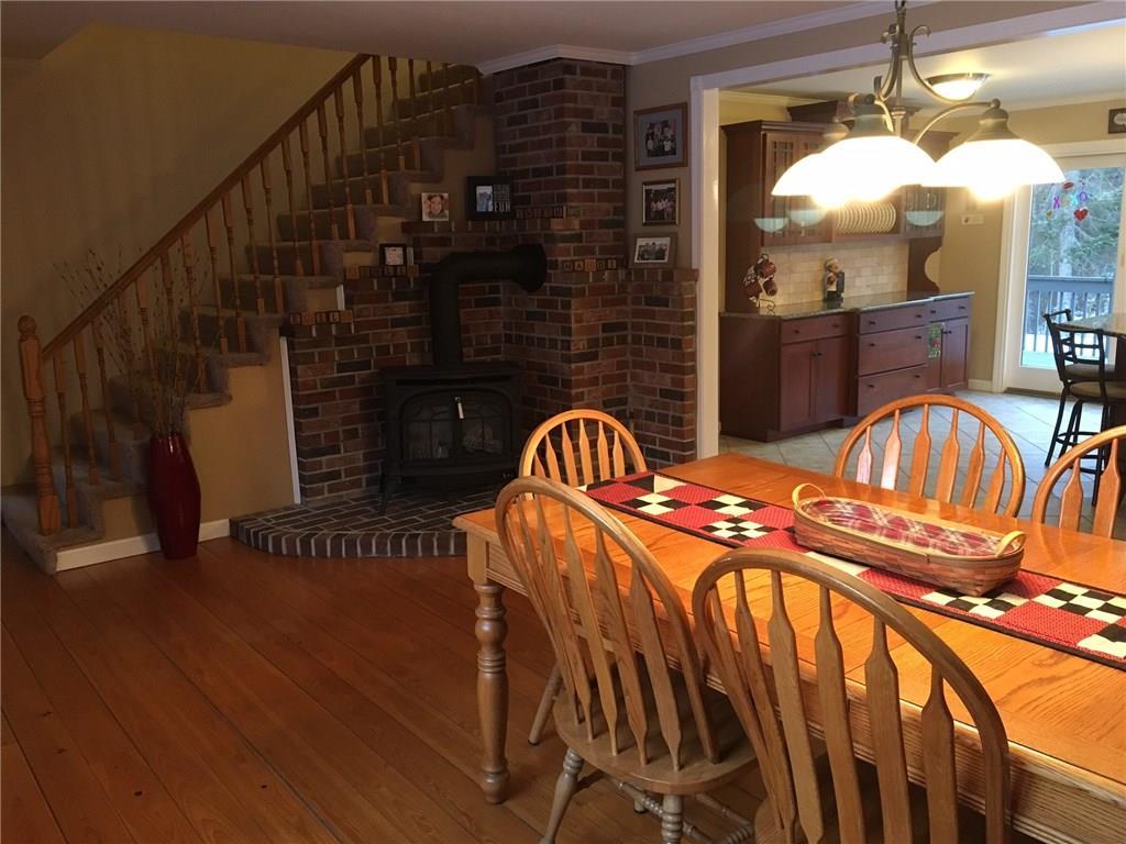 1282 Carmel Road North Hampden, ME 04444 - Photo 8 of 34 Dining area, stairway