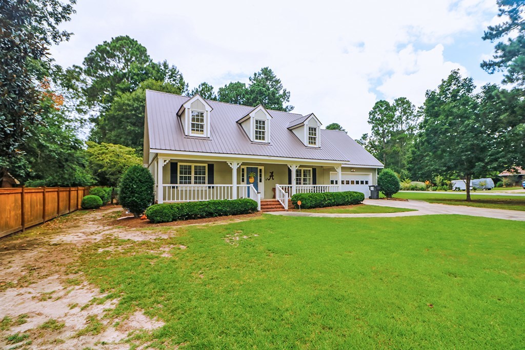 1921 Northside Road Perry, GA 31069 - Photo 2 of 49 a front view of a house with a yard