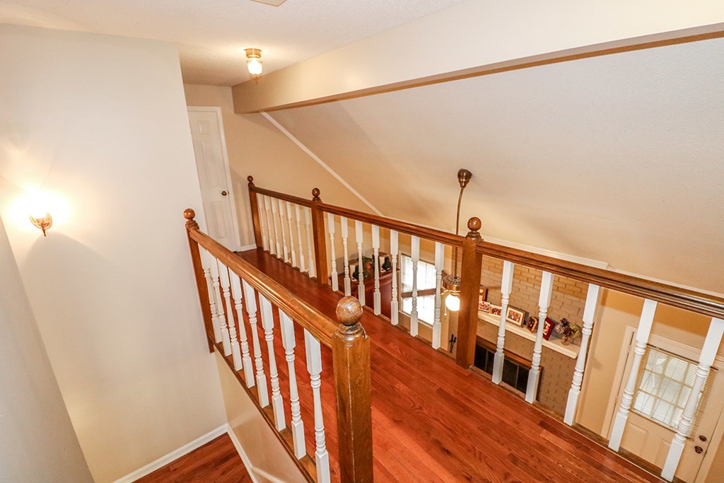 1921 Northside Road Perry, GA 31069 - Photo 12 of 49 a view of a hallway with wooden floor and staircase