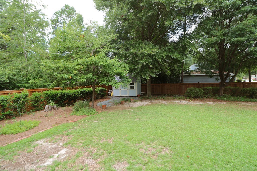 1921 Northside Road Perry, GA 31069 - Photo 30 of 49 a view of a backyard with large trees