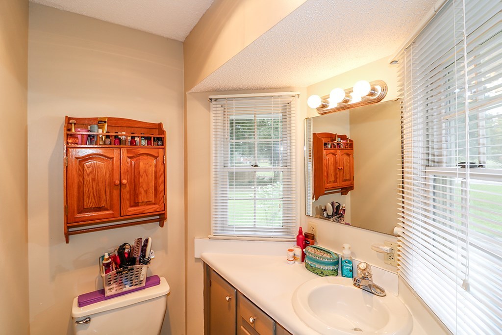 1921 Northside Road Perry, GA 31069 - Photo 40 of 49 a bathroom with a sink and a mirror