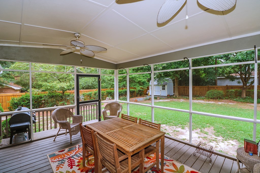 1921 Northside Road Perry, GA 31069 - Photo 45 of 49 a view of a patio with a table chairs and a backyard
