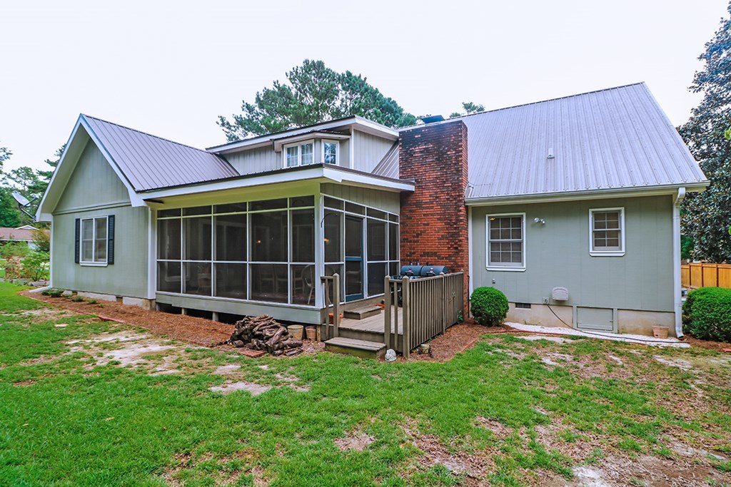 1921 Northside Road Perry, GA 31069 - Photo 47 of 49 a view of a house with a yard and sitting area
