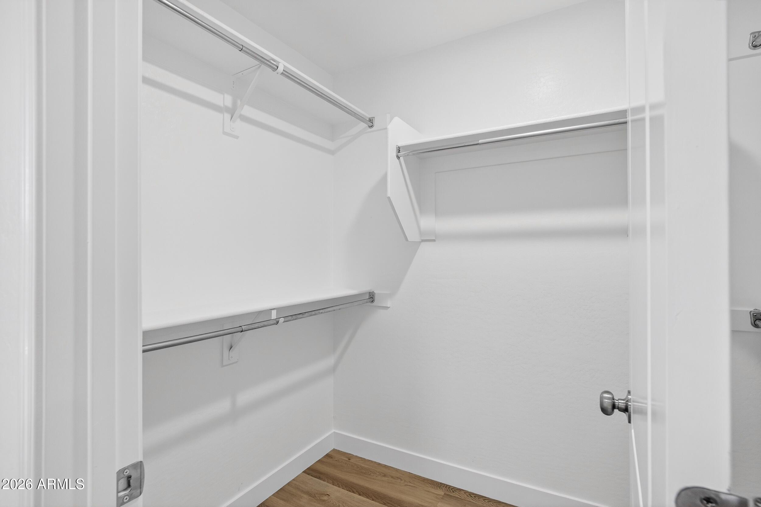 43620 West Cowpath Road Maricopa, AZ 85138 - Photo 41 of 60 a view of an empty walk in closet