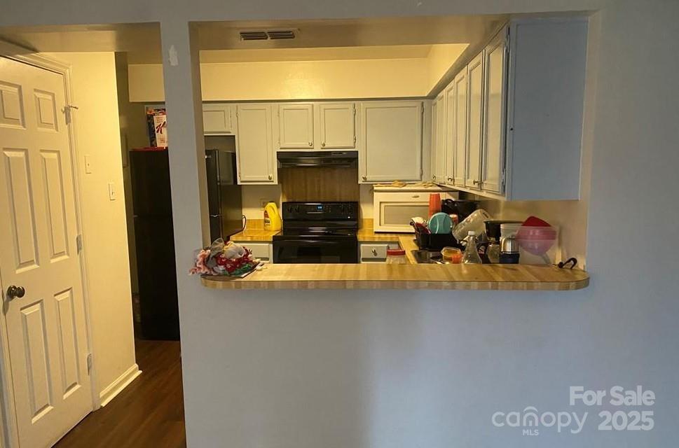 5718 Dockside Drive Charlotte, NC 28227 - Photo 5 of 5 a view of living room with furniture and a fireplace
