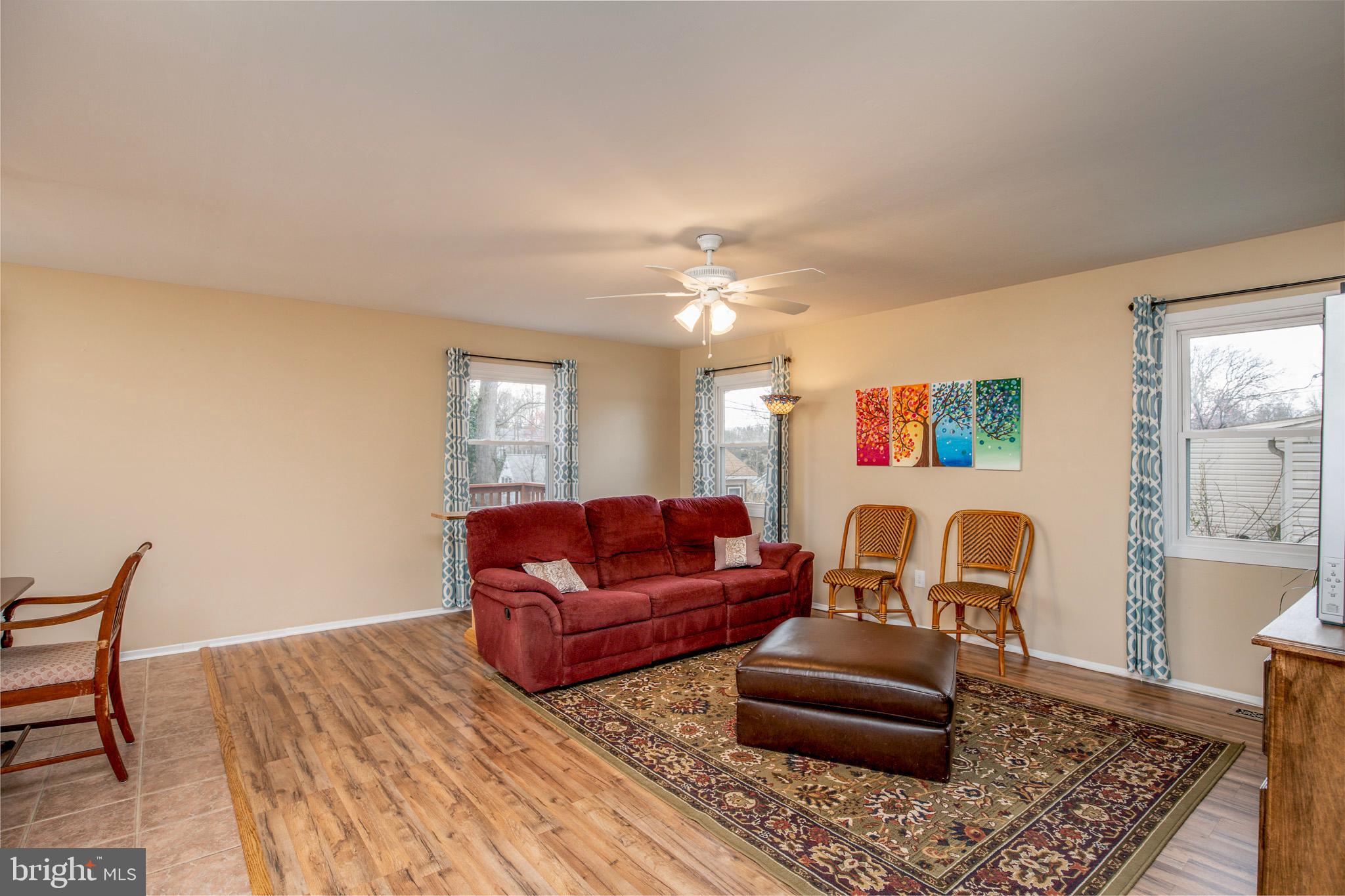 4516 Rising Lane Bowie, MD 20715 - Photo 6 of 27 Living Room with new floors, newer windows