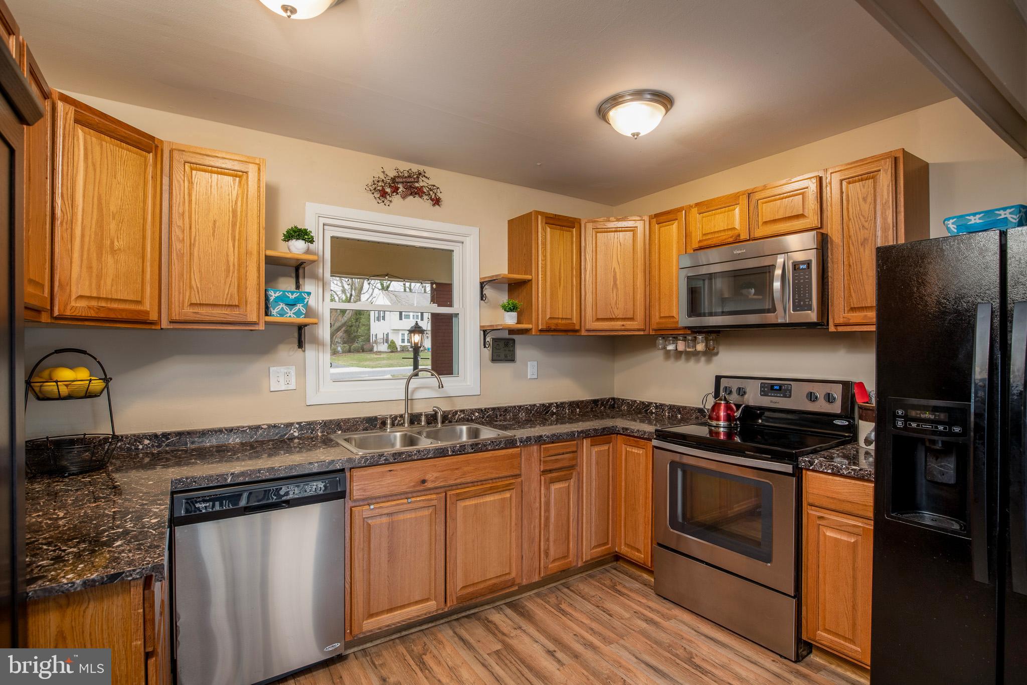 4516 Rising Lane Bowie, MD 20715 - Photo 9 of 27 Kitchen, new floors, newer stainless appliances
