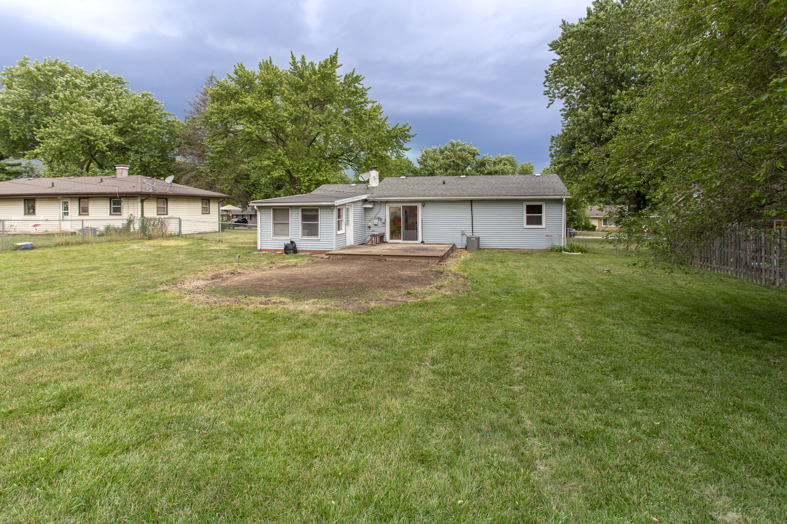 320 Hillside Road New Lenox, IL 60451 - Photo 12 of 14 a view of a yard in front of a house with large trees