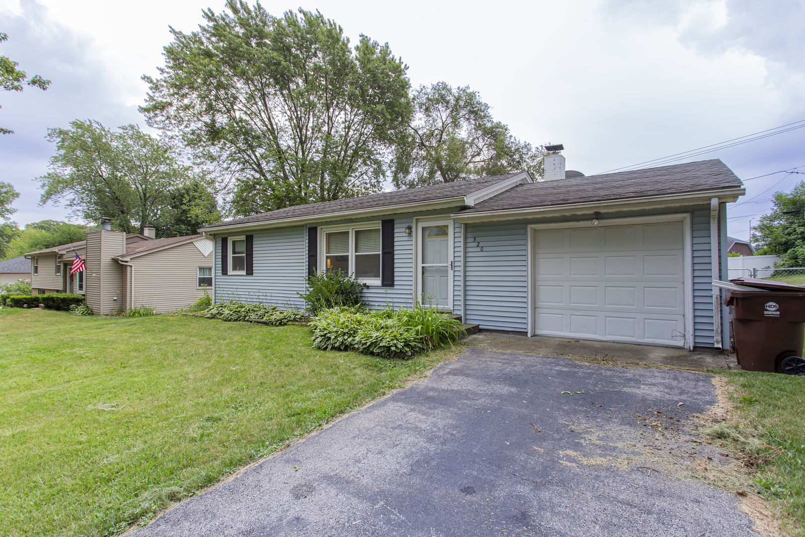 320 Hillside Road New Lenox, IL 60451 - Photo 14 of 14 a backyard of a house with plants and barbeque oven